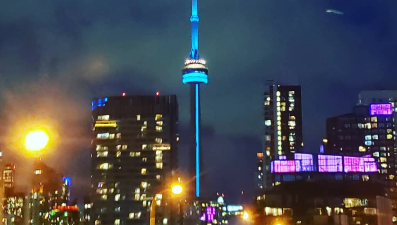 CN Tower lit blue. Toronto, Ontario